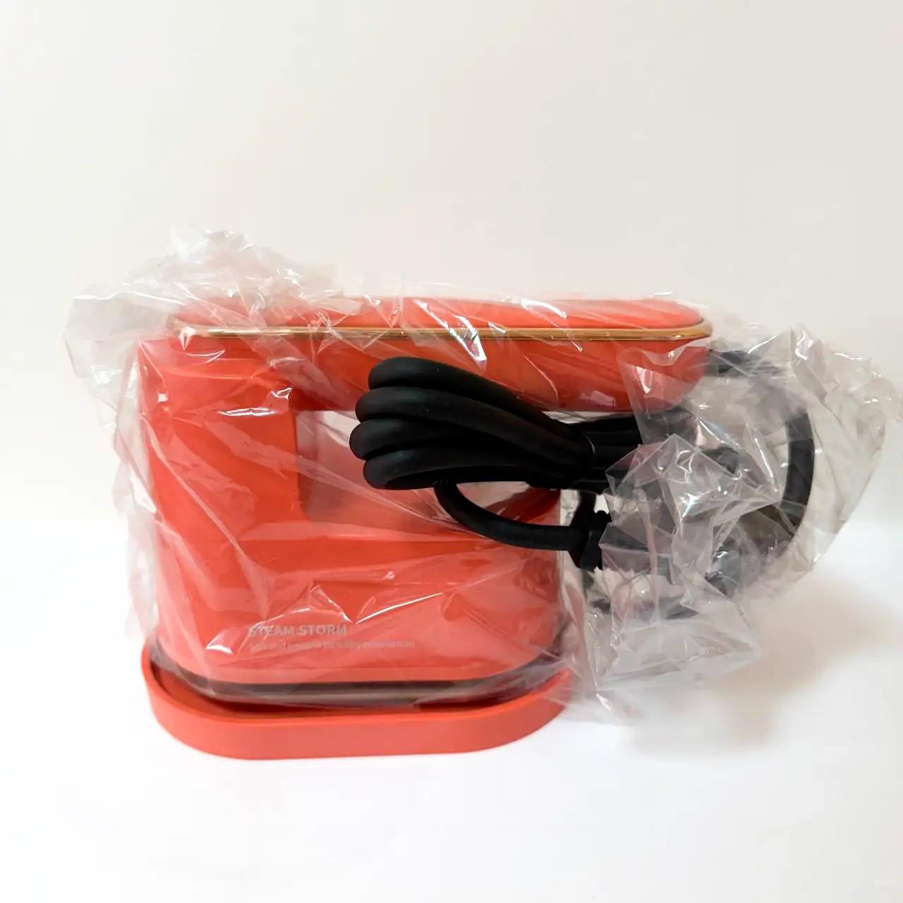 Warm Travel 1200 W travel steamer iron, orange, Decor