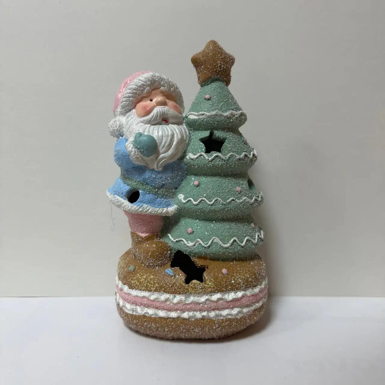 New Year's figurine with backlight ‘Santa with a Christmas tree’