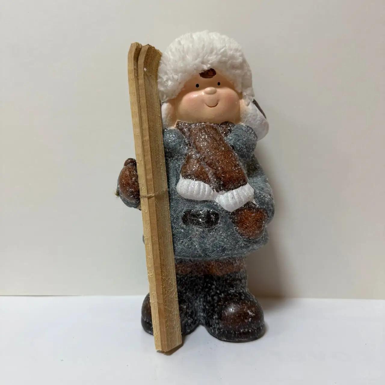 New Year's figurine ‘Boy with skis’